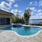 beautiful pool deck on an Orlando lakefront newly resurfaced