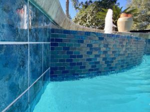 blue pool remodeling tiles