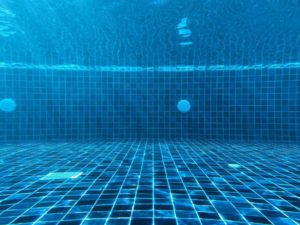 blue saltwater pool tile replacement underwater