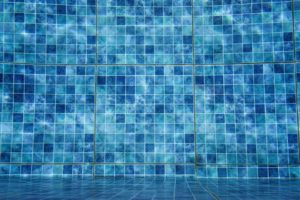 swimming pool remodeling with mosaic tiles