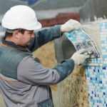 man working pool replastering