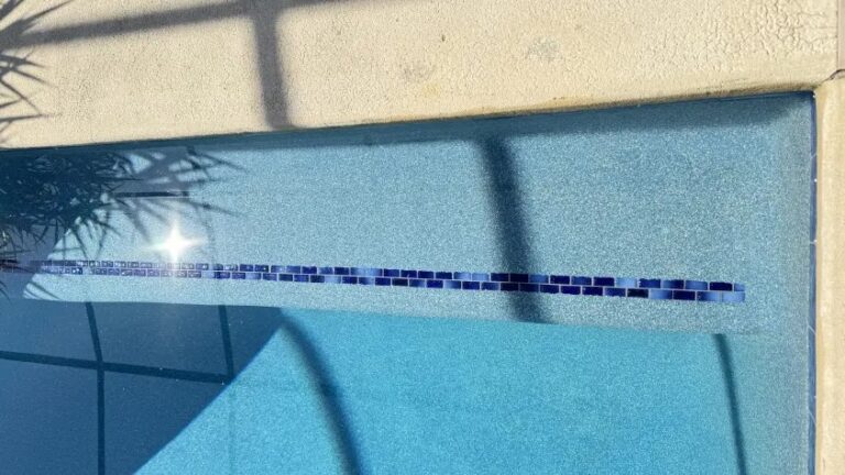 pool tiles sunlit waterline trim
