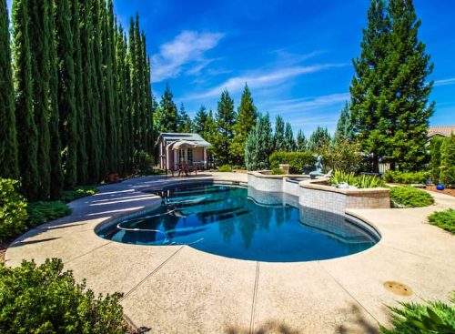 Beautiful pool renovation with landscape